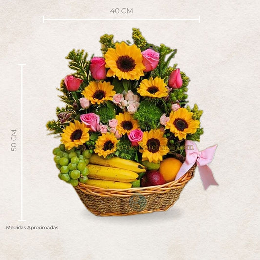canasta de frutas y girasoles